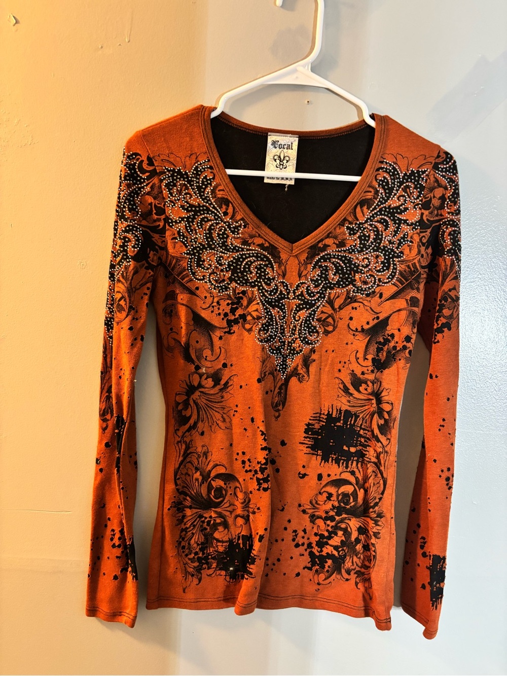 Vocal Rust Orange Long Sleeve V-Neck Top with Black Print